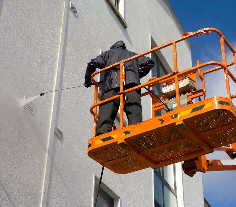 Worker Washing A Wall