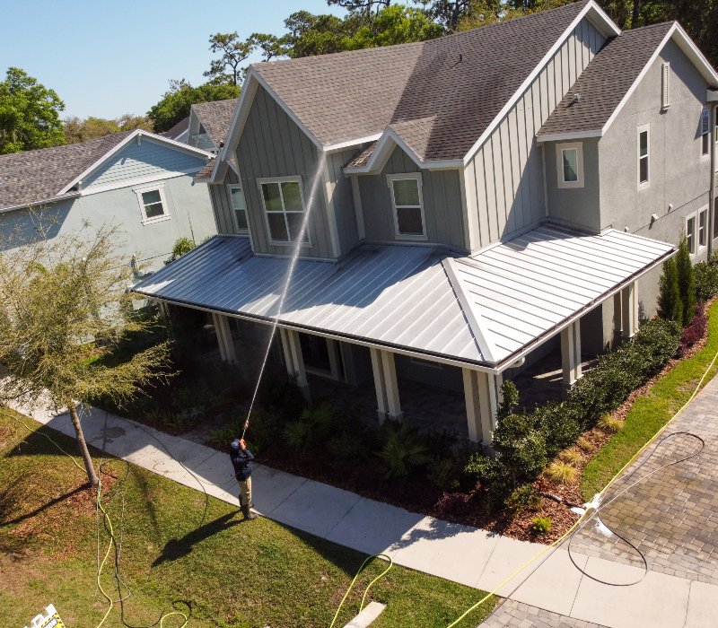 a house with a clean exterior, showing the effectiveness of professional house washing services